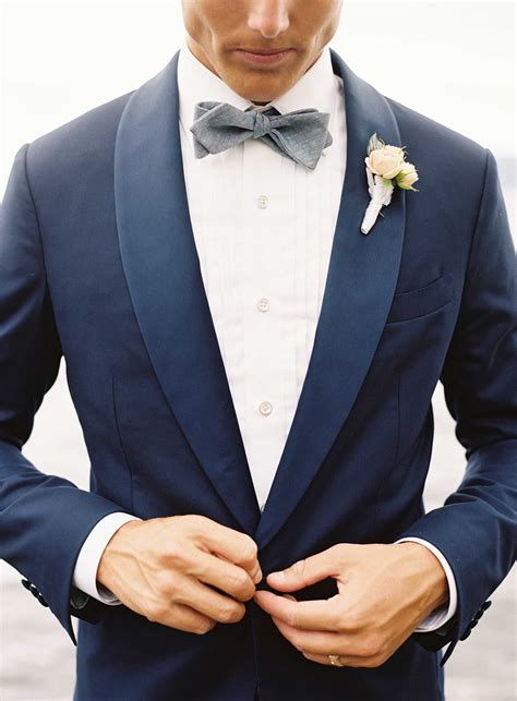 bow tie with navy suit.